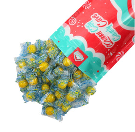 QUEEN CITY CANDY CAVE Lemonheads hard candy close-up showing tart citrus flavor.