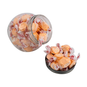 Bright orange and vanilla swirl taffy on display for color-themed events