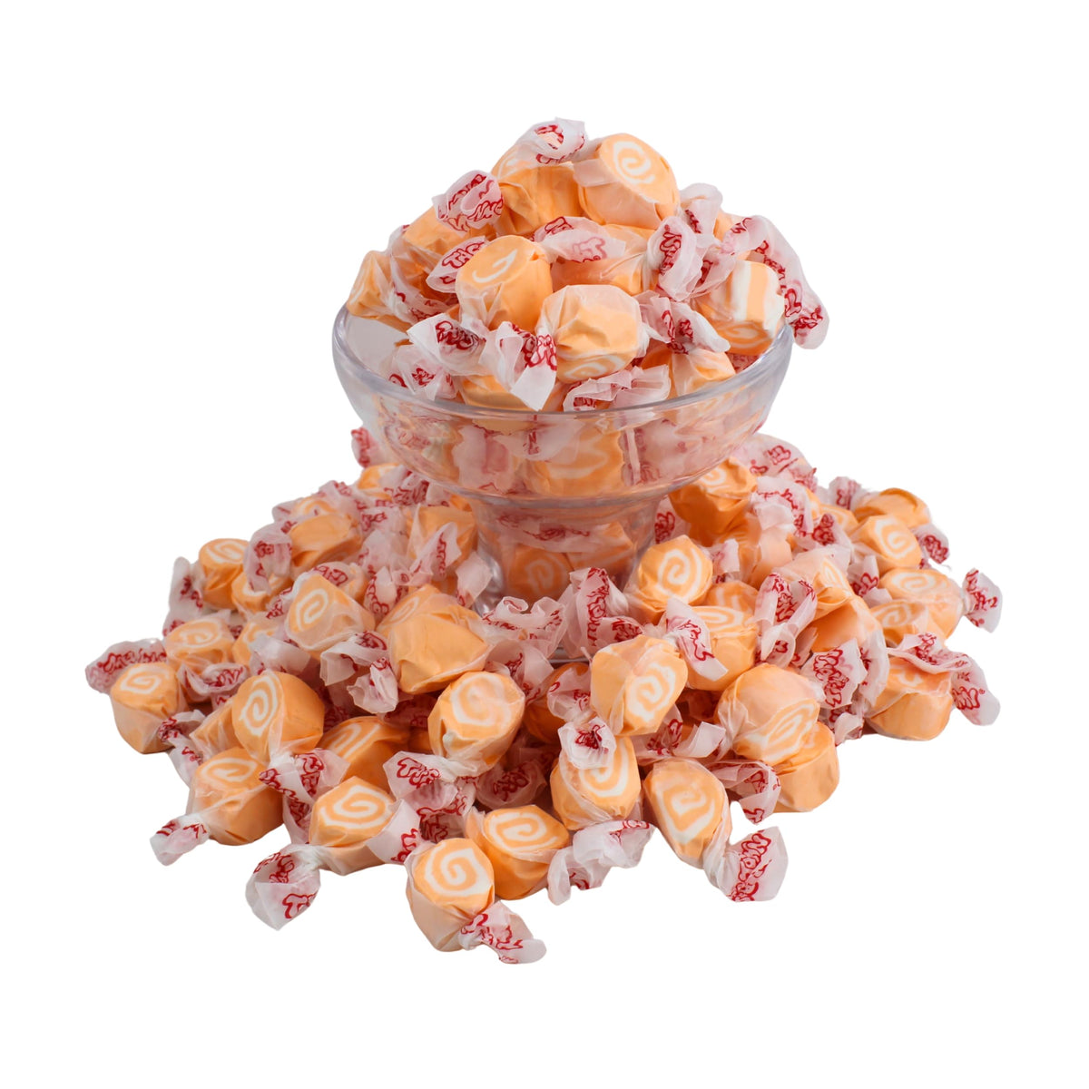 Close-up of creamy orange and white swirls in taffy, visually appealing