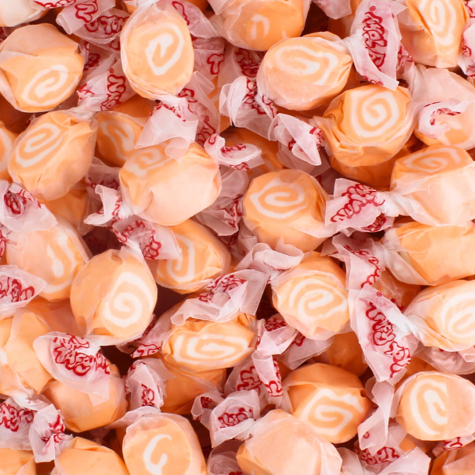 Queen City Candy Cave packaging for orange cream taffy, ideal for celebrations