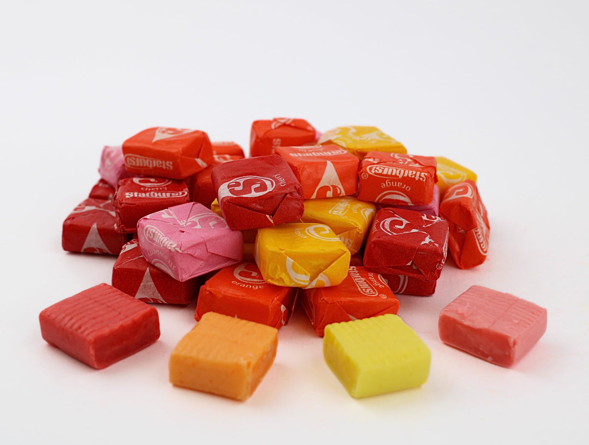 QUEEN CITY CANDY CAVE Original Star Candy yellow-wrapped, convenient school lunch treat.