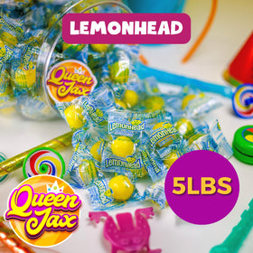 QUEEN JAX Lemonheads lemon-sour shell close-up highlights tart flavor.