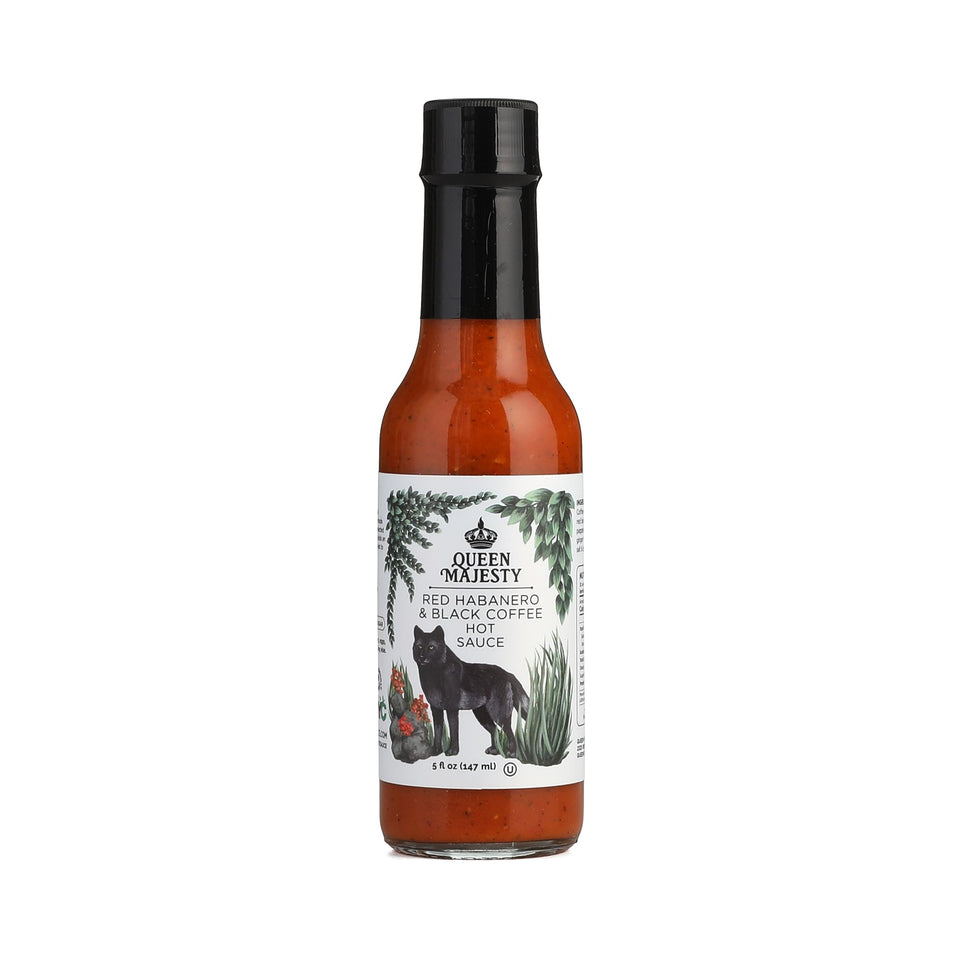 Queen Majesty Red Habanero Black Coffee Hot Sauce bottle pour enhances bold meals