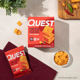 Quest Spicy Cheddar Crackers gym bag moment for post-workout refuel.