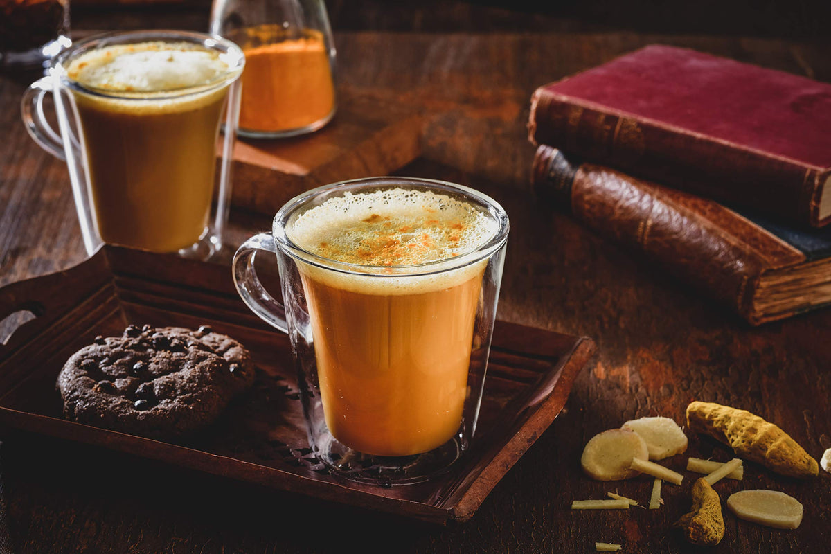QuikTea turmeric ginger chai latte four-pack packaging, a gift-ready option for tea lovers