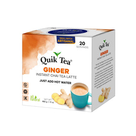 Quik Tea Ginger Chai Latte cup steaming; ready in minutes for a cozy pause.
