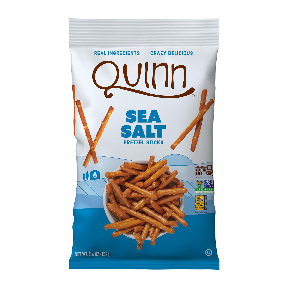 Quinn gluten-free sea salt pretzel sticks close-up with seasoning for dipping.