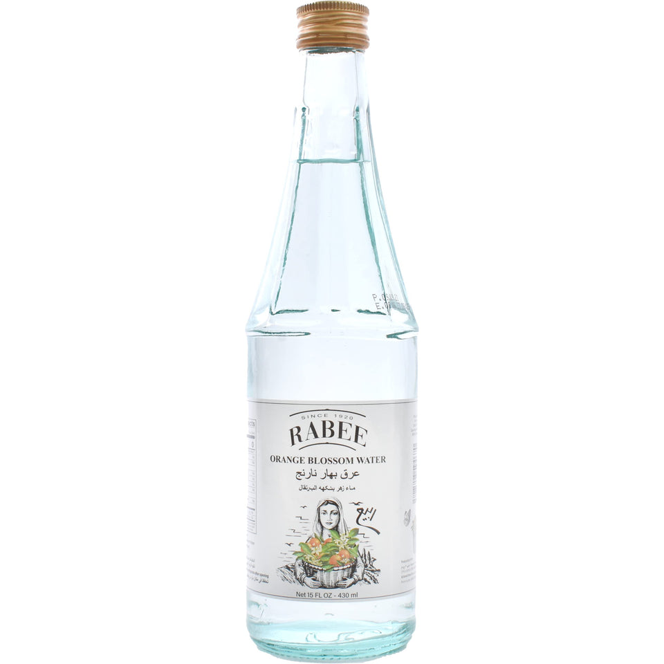 Rabee Orange Blossom Water bottle pour adds delicate aroma to desserts.