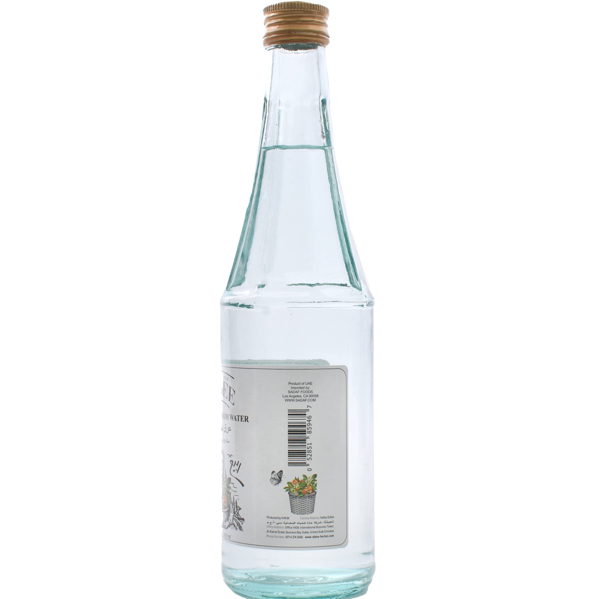 Rabee Orange Blossom Water bottle pour close-up emphasizes floral fragrance.