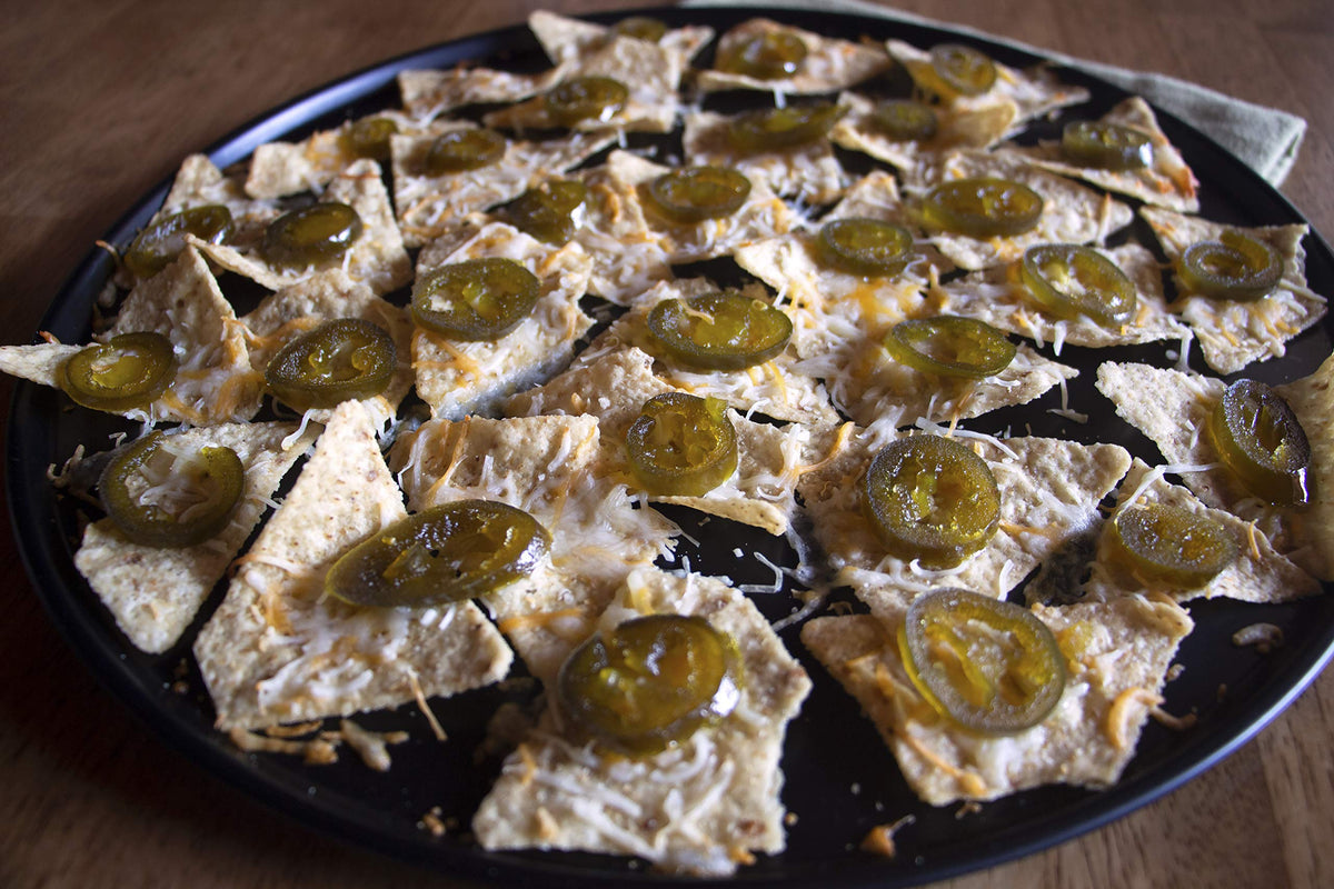 Ragin' Cajun Fixins jalapeno slices on a charcuterie board; balanced heat.