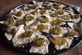 Ragin' Cajun Fixins jalapeno slices on a charcuterie board; balanced heat.