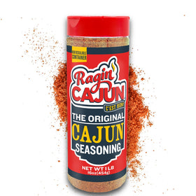 Ragin' Cajun Original Seasoning jar pouring for bold grilling flavor.