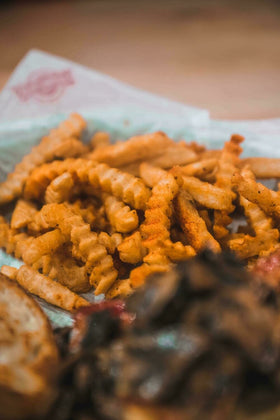 Ragin' Cajun Original Seasoning on popcorn for savory snack upgrade.
