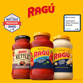Family dinner scene featuring RAGÚ Alfredo sauce ready to serve