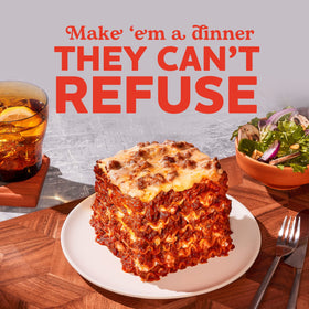 RAGÚ Old World Style Sauce with Meat on a family dinner table scene