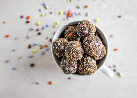 Rainbow Sunny Seeds brighten party favors with candy-coated charm.