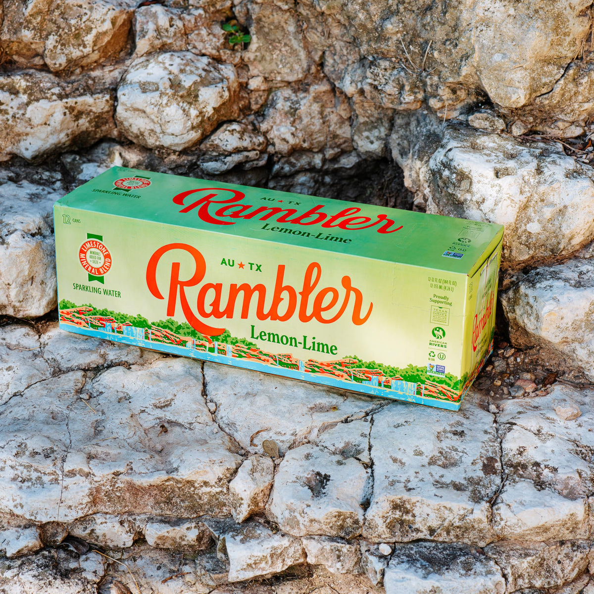 Rambler AUTX lemon-lime slice beside the sparkling water can
