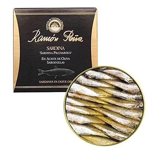 Ramon Pena sardines in olive oil can on shelf, ready-to-serve protein for quick meals.