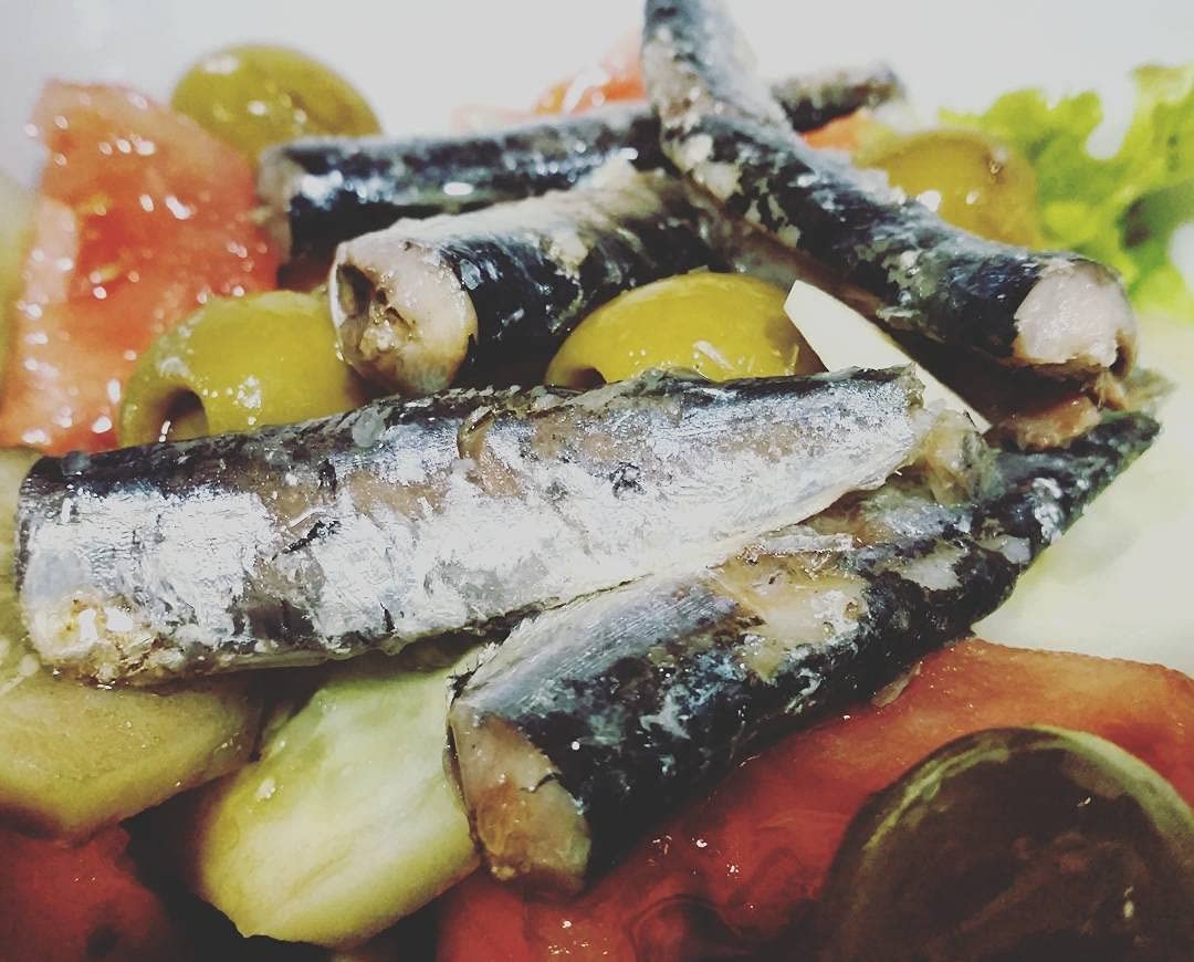 Ramon Pena canned sardines in olive oil with glossy label, ideal for tapas or toast toppings.