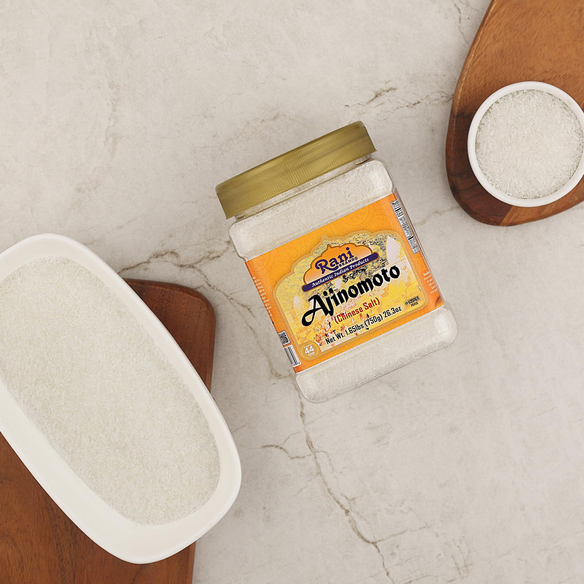 Rani Ajinomoto jar spooned into sauce for richer flavor