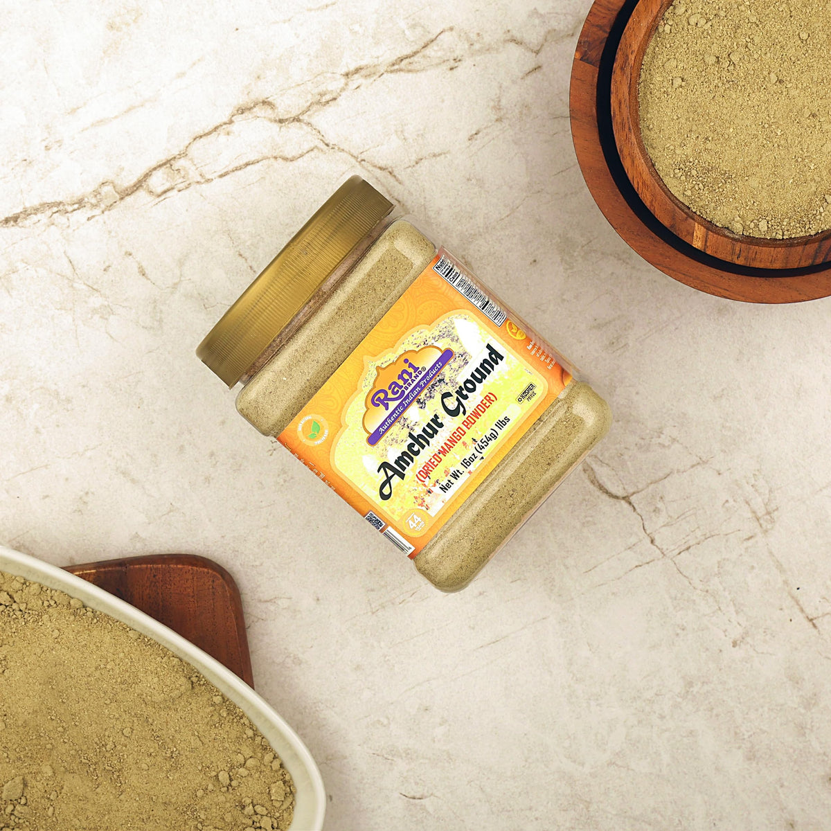 Rani Amchur jar on kitchen shelf shows convenient 16oz packaging.