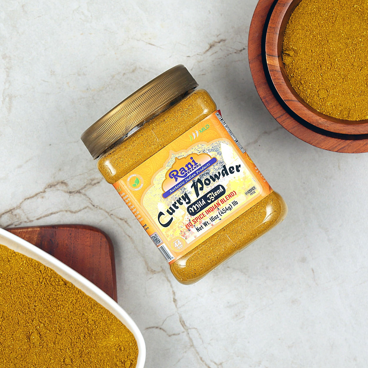 Rani Curry Powder Mild label close-up highlighting salt-free and no-chili features.