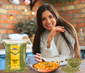 Rani Green Peas cooked in soup, adding protein and texture.