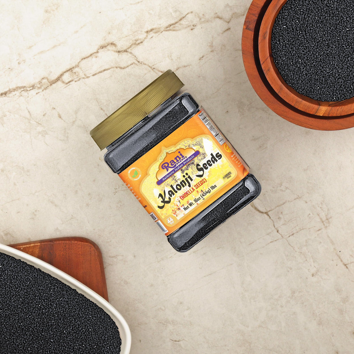 Rani Kalonji seeds jar closeup reveals rich texture and aroma