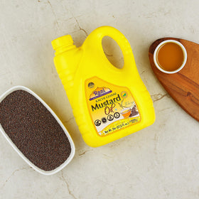 Rani Mustard Oil glass bottle emphasizes premium packaging for massage use