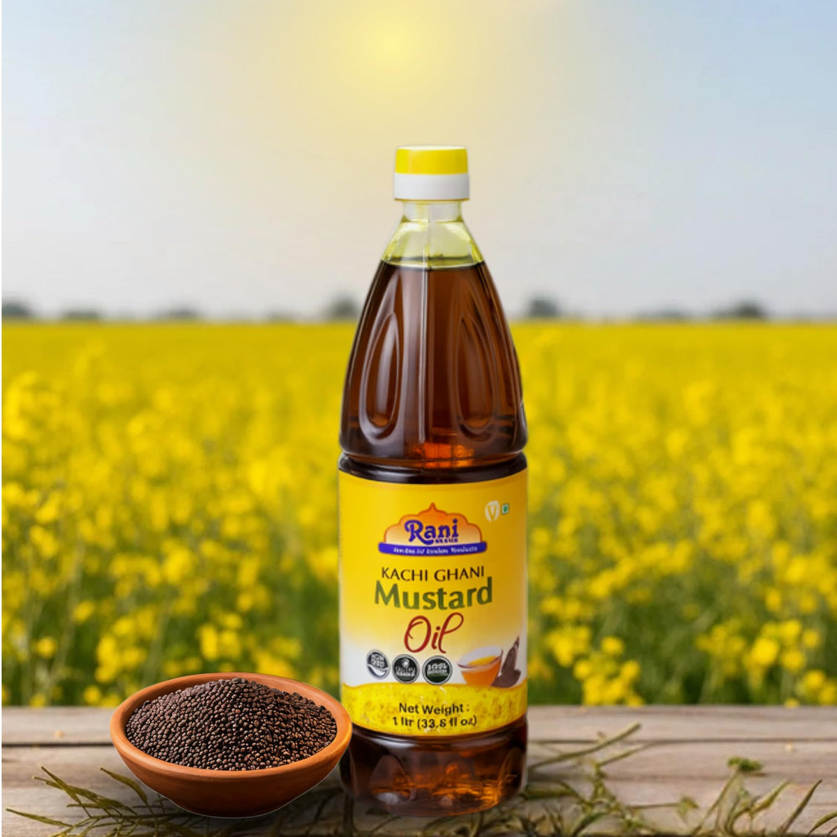 Close-up of Rani Brand mustard oil label highlighting kosher and non-GMO features.