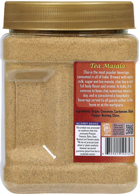 Rani spice blend in a glass bowl with fresh aromatics.