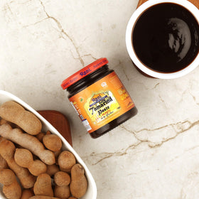 Product of India badge with Rani Tamarind paste packaging