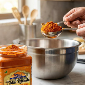 Close-up of Rani Tikka Masala spice blend shows rich aroma.