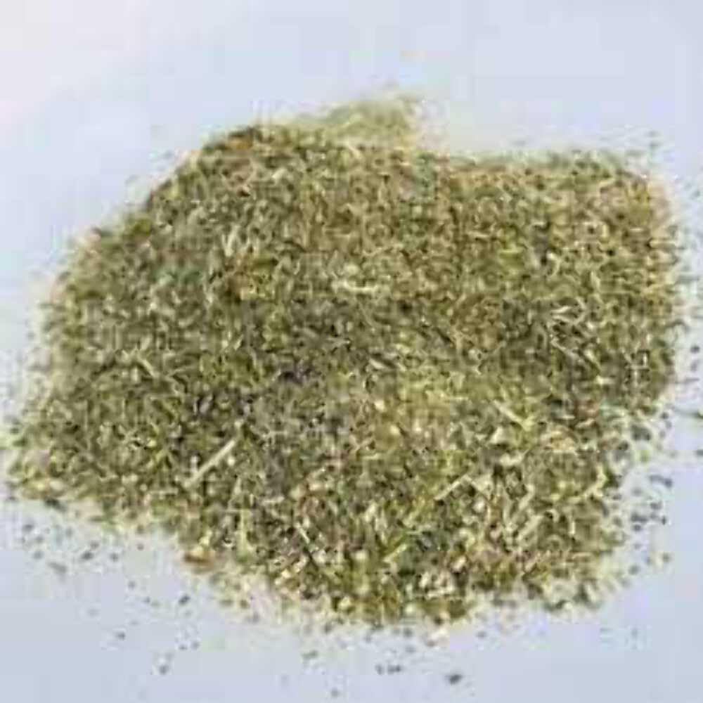 Rastaman Stew loose tea in cup beginning to brew with aroma