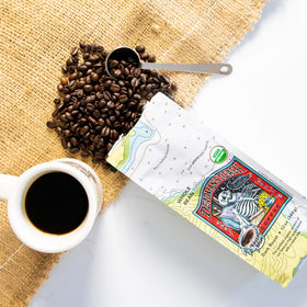 Raven’s Brew Deadman’s Reach whole beans on a kitchen counter