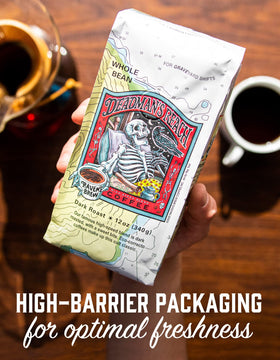 Raven's Brew Deadman's Reach dark roast close-up showing deep color and texture