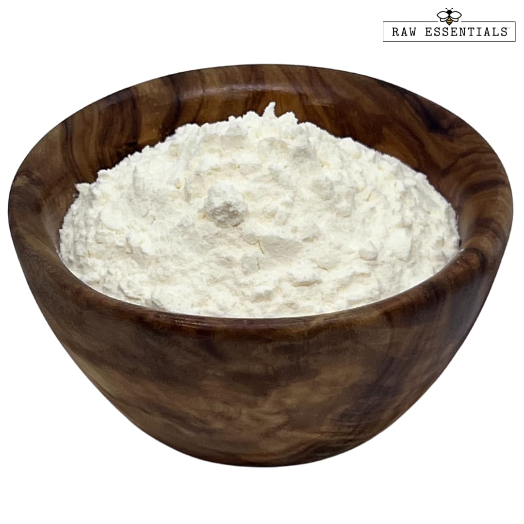 Raw Essentials Asiago Cheese Powder dusted over pasta for creamy depth