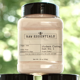 Raw Essentials bacon curing setup featuring pork slices and pink salt