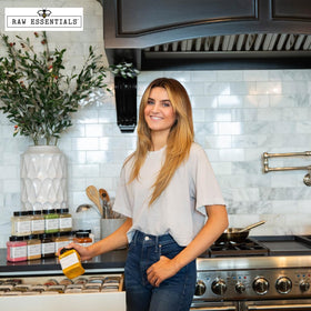 Raw Essentials cheddar powder ingredients close-up highlights dairy-based non-GMO sourcing.