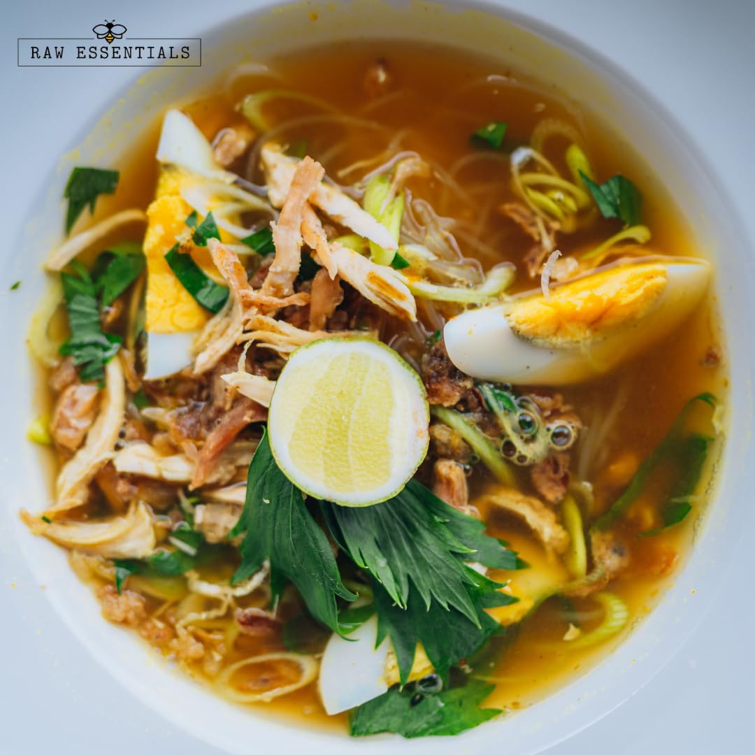 Raw Essentials Chicken Soup Blend on rustic kitchen setup for home cooking versatility.