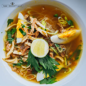 Raw Essentials Chicken Soup Blend on rustic kitchen setup for home cooking versatility.