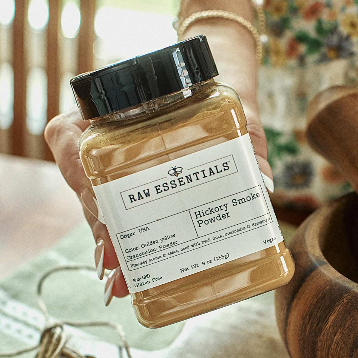Kitchen scene featuring Raw Essentials Hickory Smoke Powder jar