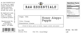 Raw Essentials Honey Aleppo Pepper atop a fresh salad