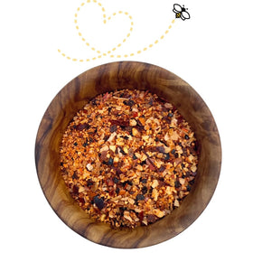 Pouring Raw Essentials Honey Aleppo Pepper adds a sweet-spicy kick