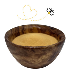 Raw Essentials Mesquite Smoke Powder being poured for easy rub seasoning