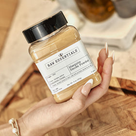 Close-up of Raw Essentials Mesquite Smoke Powder showing fine texture for smooth blends