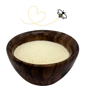 Raw Essentials orange powder in a jar, ideal baking ingredient.