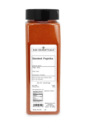Raw Essentials smoked paprika powder jar showcases rich, smoky flavor for BBQ and roasts.