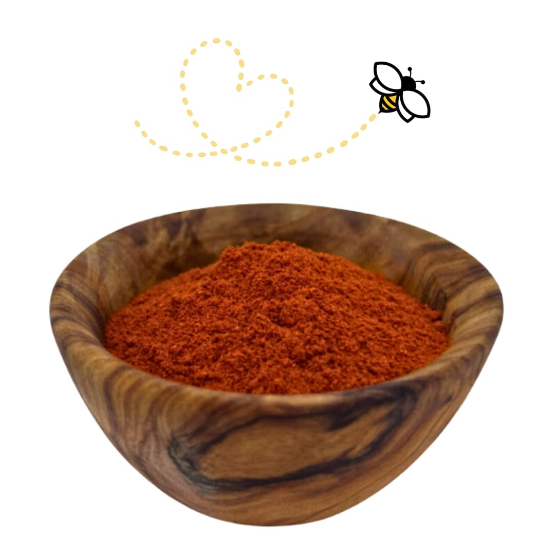 Raw Essentials smoked paprika powder label highlights Spanish origin for authentic depth.