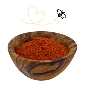 Raw Essentials smoked paprika powder label highlights Spanish origin for authentic depth.